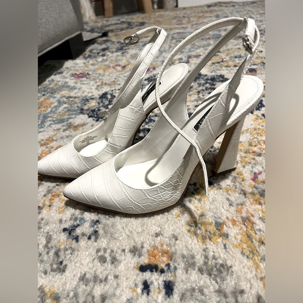 Snake skin sling back heels